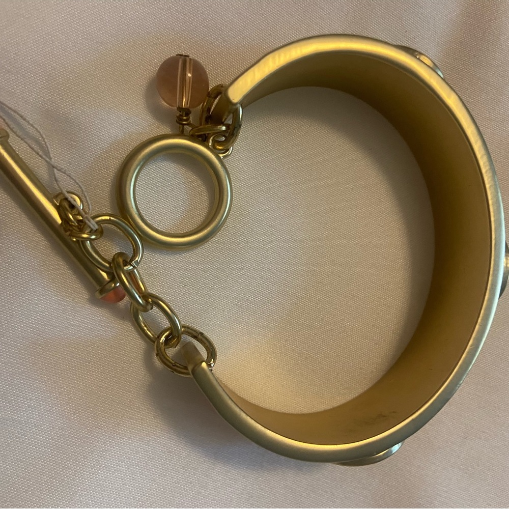 Brand new cuff bracelet. Gold.